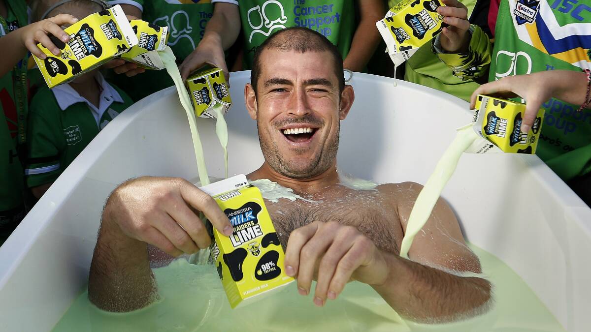 Terry Campese in a bath of Raiders Lime. Picture: Jeffrey Chan