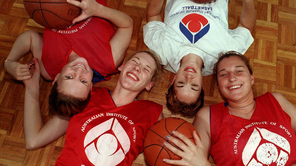 The AIS pioneers from left to right: Penny Taylor, Lauren Jackson, Kristen Veal and Suzy Batkovic before the 1998-99 WNBL grand final. Picture by Richard Briggs