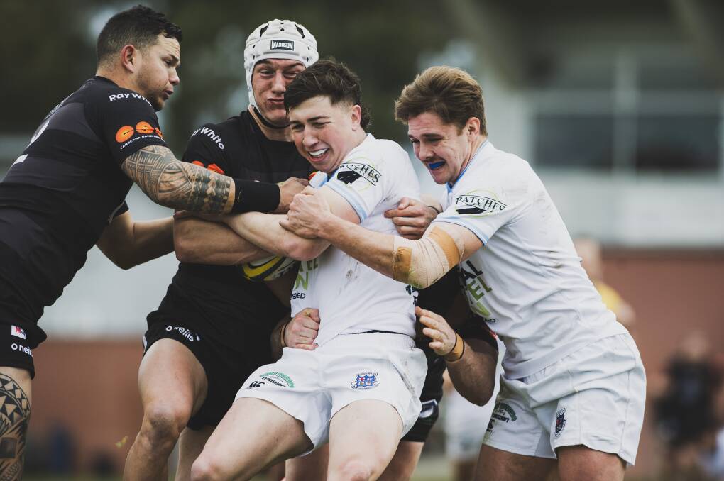 Brendan Jimenez, centre, scored the clincher for the Whites in the second half. Picture: Dion Georgopoulos