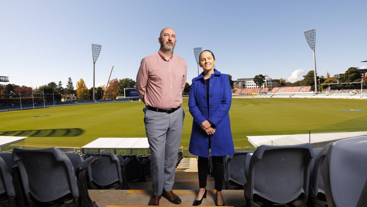 Venues Canberra boss Matt Elkins, left, and Cricket ACT chief executive Olivia Thornton at Manuka Oval. Cricket ACT has joined the push for a new eastern grandstand at Manuka Oval. Picture by Keegan Carroll