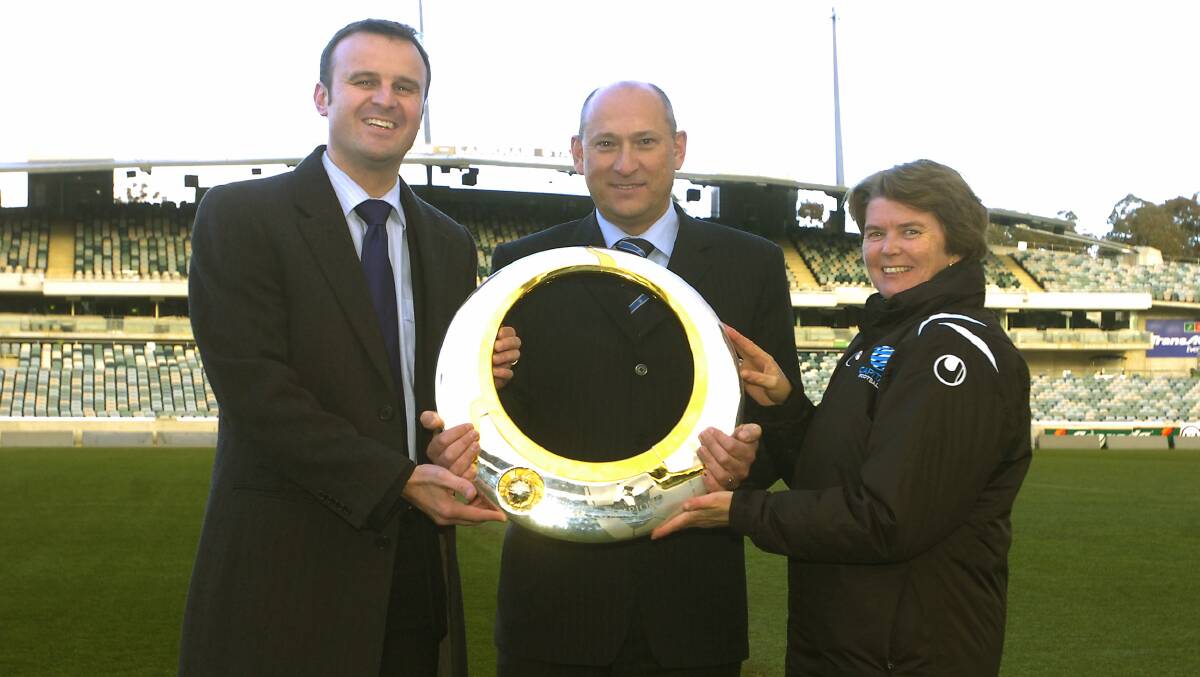 Ivan Slavich, middle, led Canberra's first bid for an A-League team in 2008. He worked with then sport minister Andrew Barr, left, and former Capital Football chief executive Heather Reid. Picture by Martin Jones