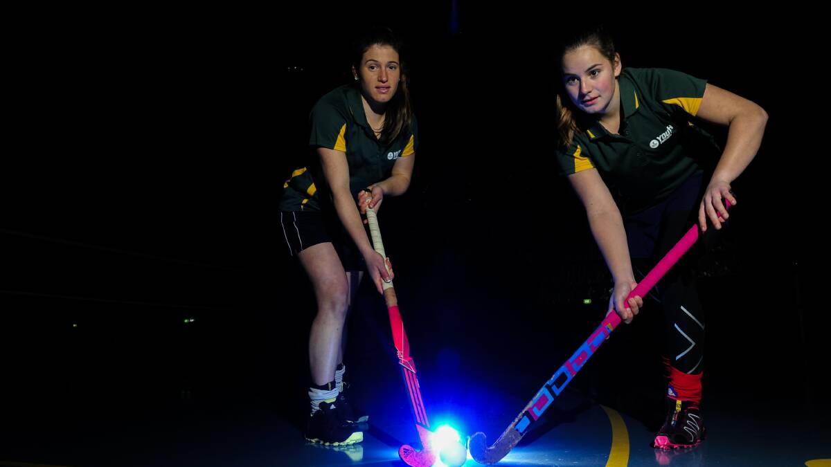 Laura Reid, right, was picked in the Australian junior hockey side in 2015. Picture by Melissa Adams