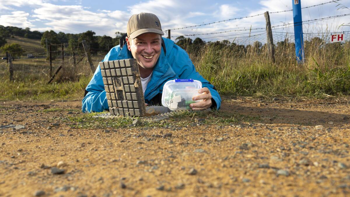 Daniel Newton, aka Darkside Dan, has more than 2000 Geocaching hides in and around Canberra. Picture by Gary Ramage
