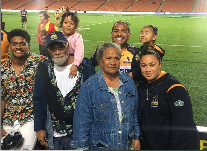 Solomone Kata with his family after the Brumbies beat the Chiefs in Hamilton on February 22.