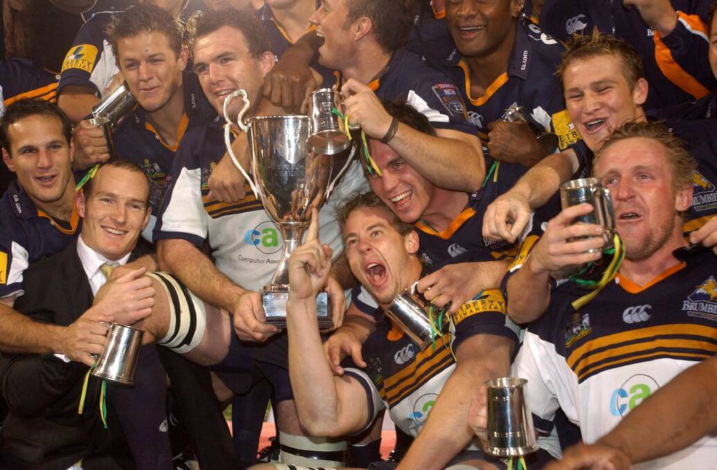 The Brumbies celebrate their 2004 title. Picture by Jodie Richter