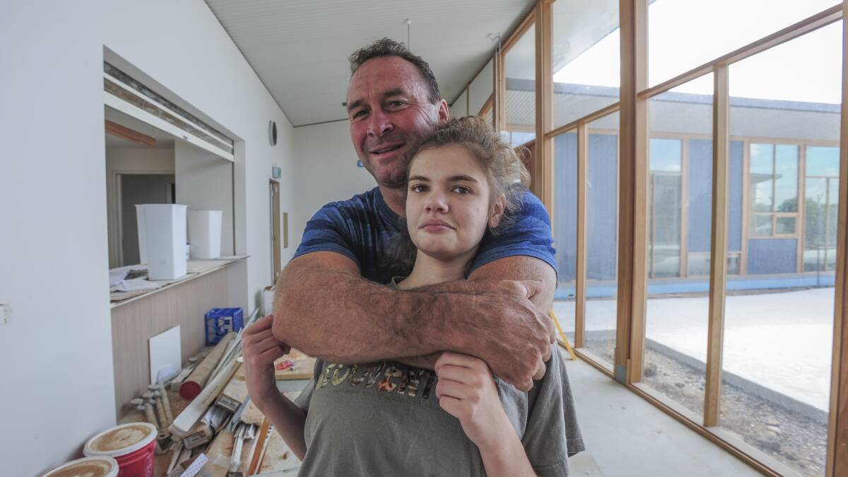 Ricky Stuart and daughter Emma, who is the inspiration behind the Ricky Stuart Foundation. Picture: Graham Tidy