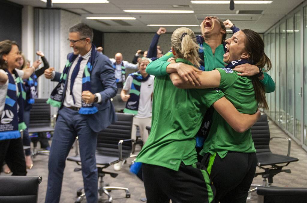 Matildas players and FFA staff celebrate the World Cup announcement on Friday morning. Picture: Getty Images