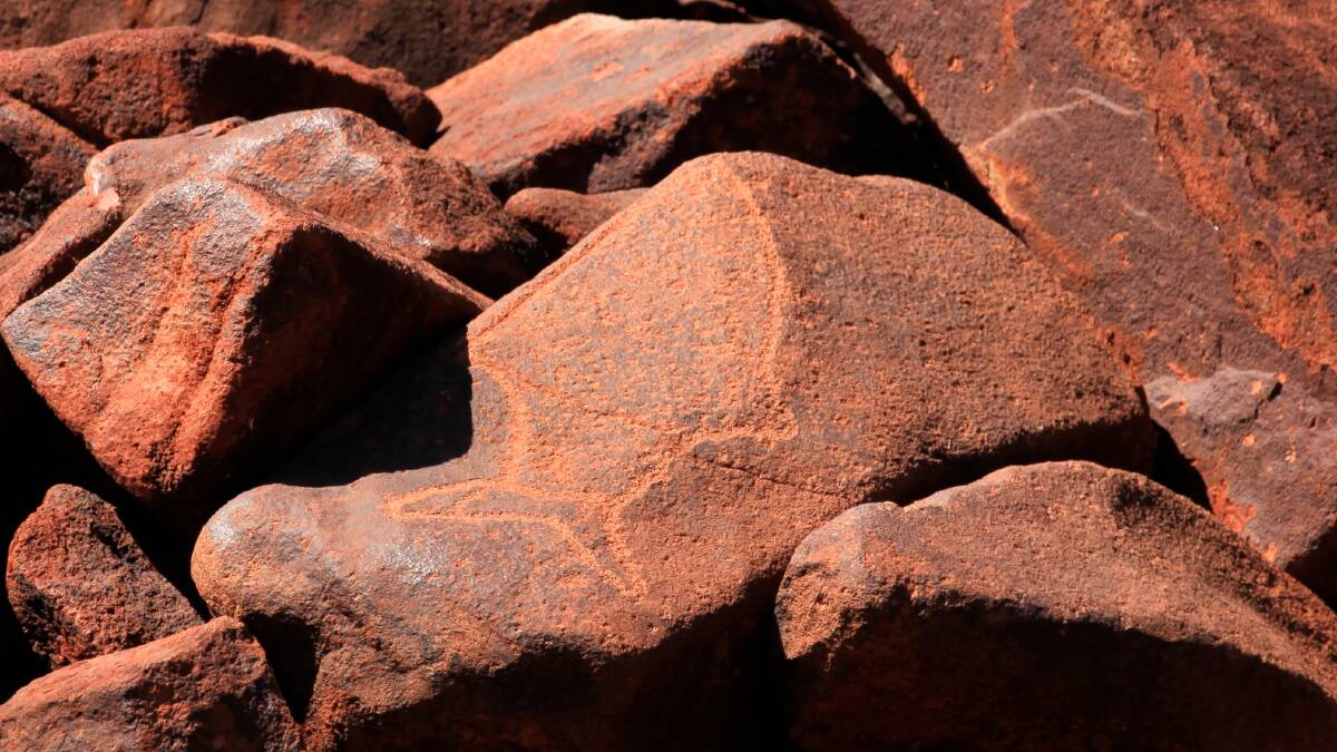 An Aboriginal fish engraving on a rock at the historic Burrup Peninsula in Western Australia. Picture Shutterstock