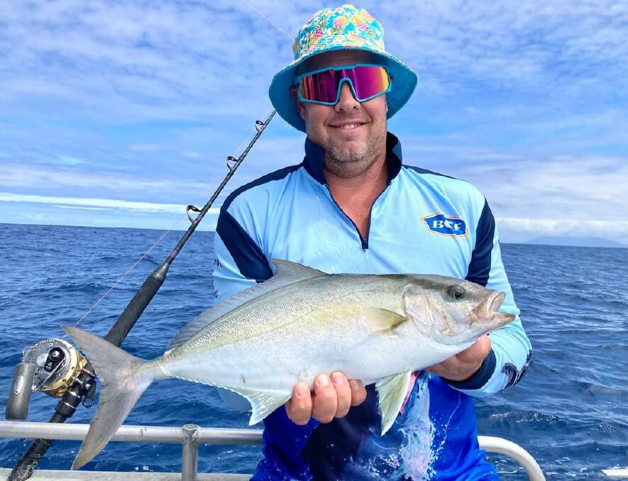 Canberra angler Peter Bickerton with a tropic visitor an amberjack caught a couple of days ago off Narooma.