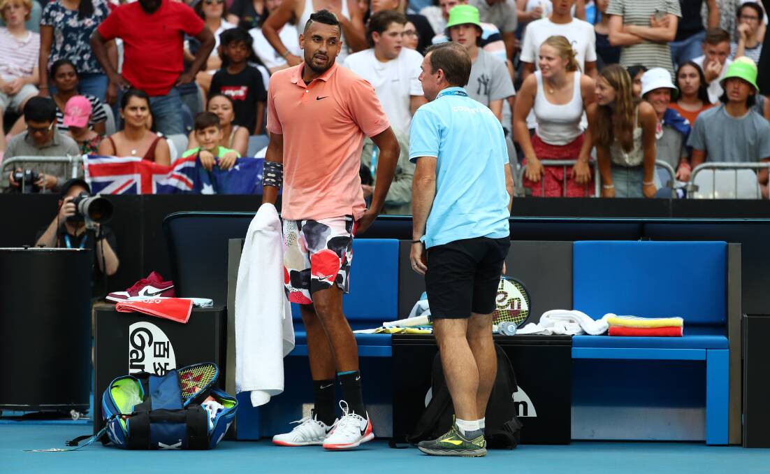 Nick Kyrgios clutched at his leg during the first set. Picture: Getty Images