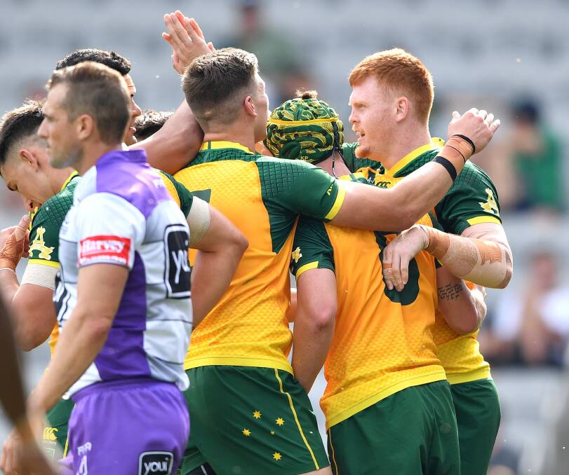 Corey Horsburgh celebrates his second-half try with Junior Kangaroos teammates. Picture: NRL Imagery