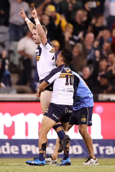 Ryan Lonergan of the Brumbies celebrates kicking the winning goal. Picture: Getty Images 