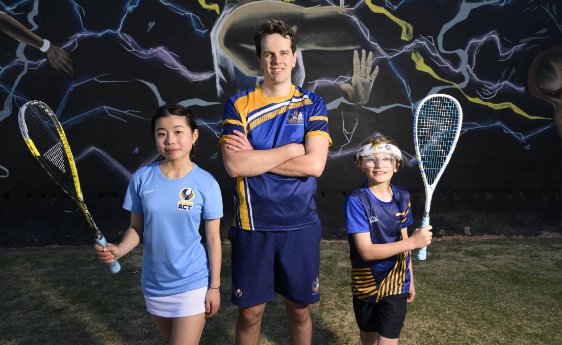 Squash players Christabelle Choo, 17, Tom Calvert and Huck Steele, 12, are excited for squash being announced as a potential new sport at the 2028 Olympics at Los Angeles. Picture by Keegan Carroll