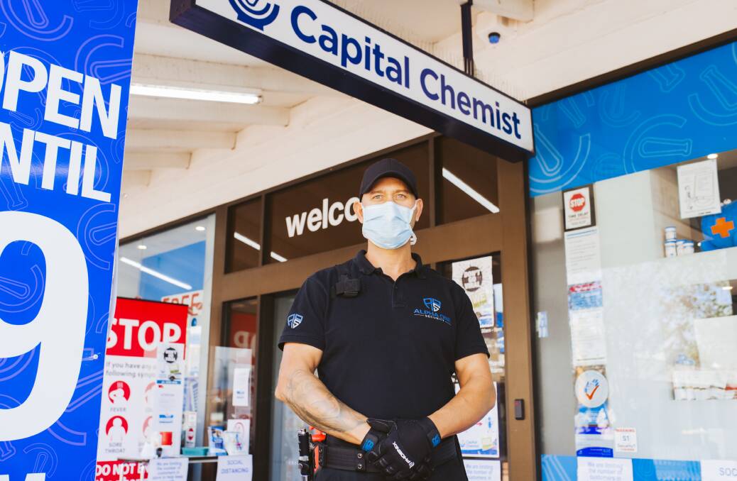 Capital Chemist Charnwood have had to employ security along with a huge sign in the carpark to deal with violent and sick customers. Picture: Jamila Toderas