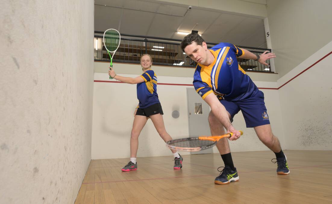 Squash players Tom Calvert (front) and June Steele, 14, are excited for squash being announced as a potential new sport at the 2028 Olympics at Los Angeles. Picture by Keegan Carroll