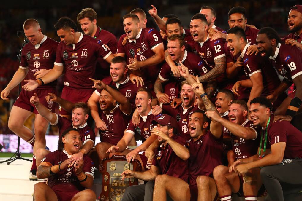 Maroons players celebrate winning the State of Origin series at Suncorp Stadium on Wednesday night. Picture: Getty Images