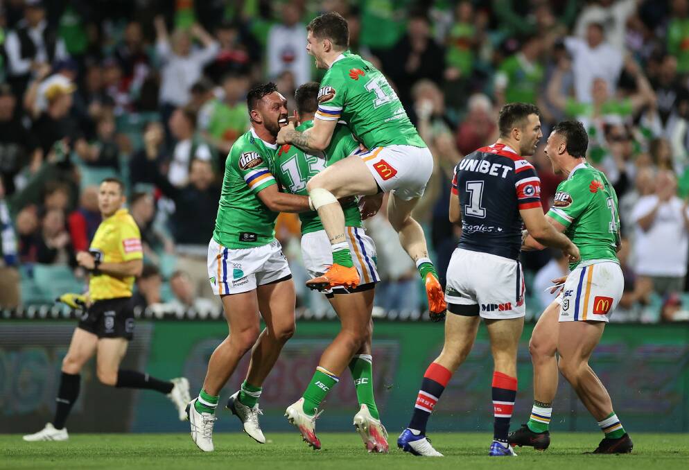 The Raiders celebrate one of their four tries. Picture: Getty Images