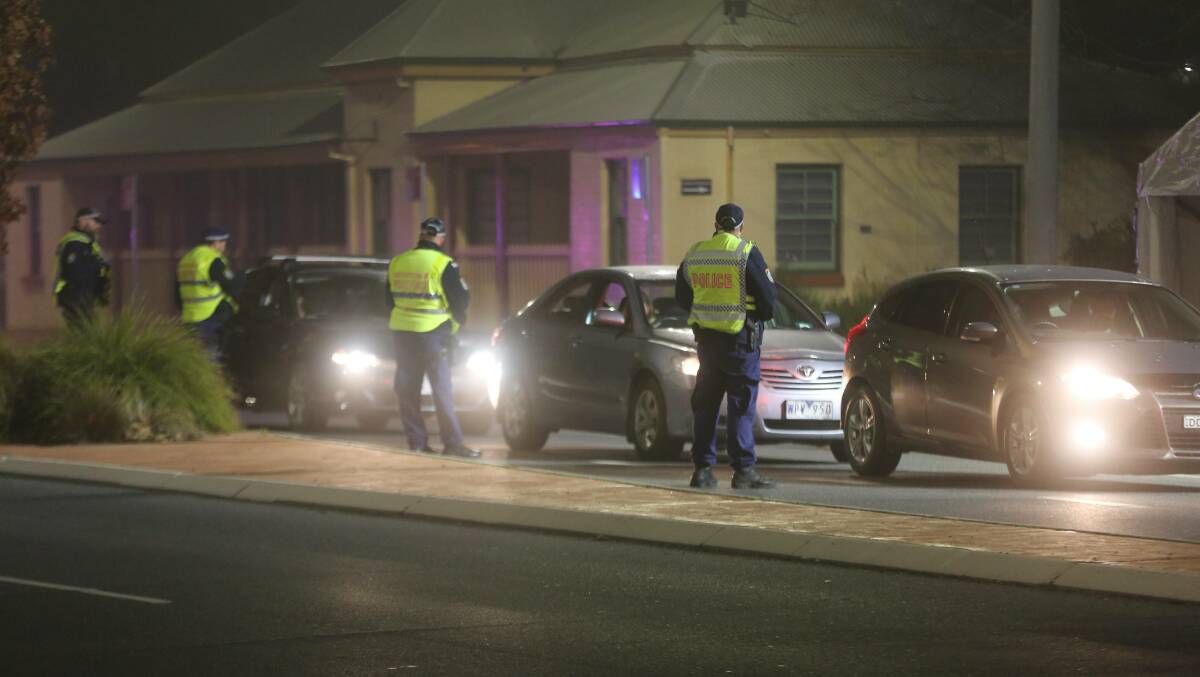 Police monitoring arrivals from Victoria at the Albury border crossing this week. Picture: NSW Police

