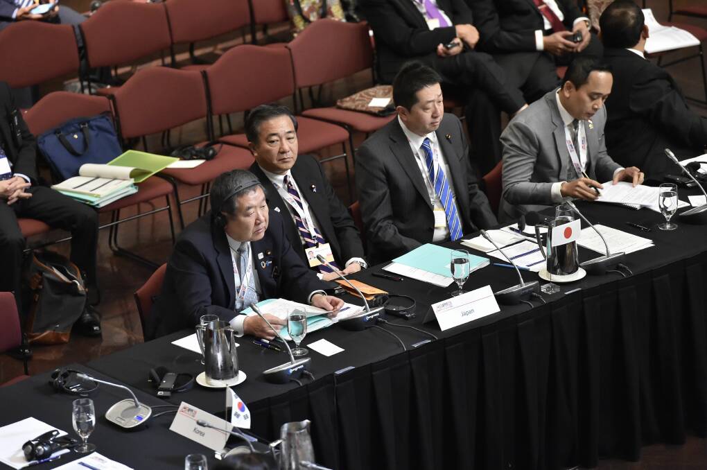  The Japanese delegation, Akira Sato, Akihisa Nagashima and Hirano Honda, at the Asia Pacific Parliamentary Forum in Canberra on Tuesday. Picture: Graham Tidy Auspic, Department of Parliamentary Services