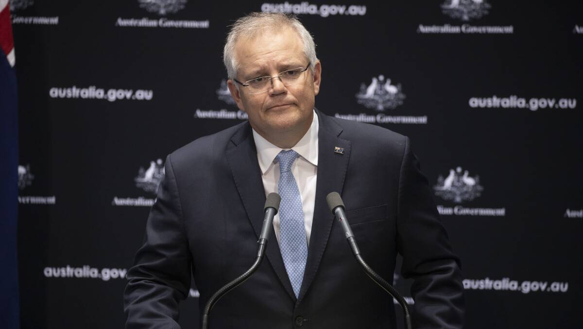 QUESTIONS: Prime Minister Scott Morrison talks about responsibility without wanting to accept any. Picture: Sitthixay Ditthavong