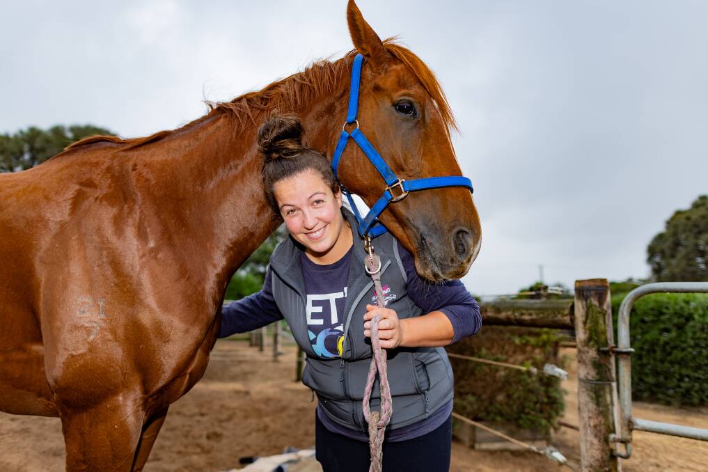 Jordyn Murphy saved racehorse Cleitus after he started swimming out to sea and behind the breakwater when he tripped on seaweed. Picture by Anthony Brady