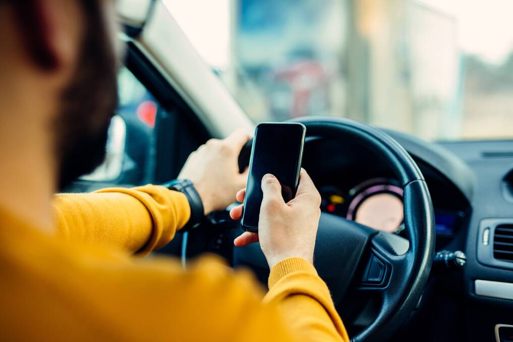Cameras could soon ping Canberrans for using mobile phones while driving. Picture: Shutterstock