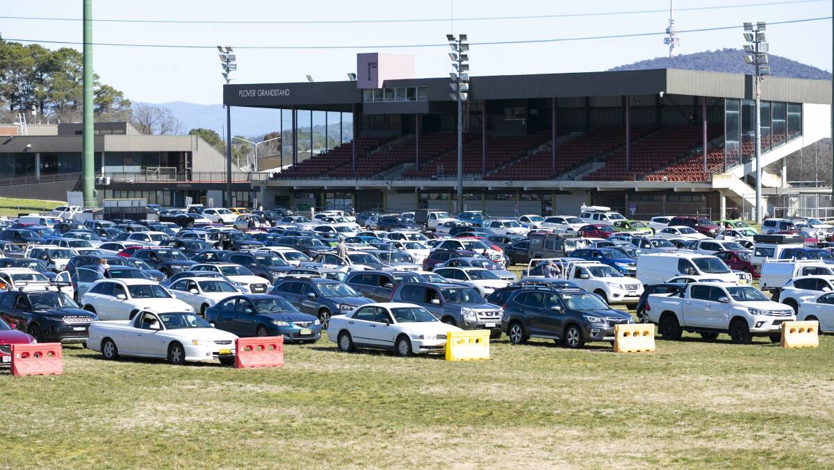 Cars lined up for COVID tests at EPIC at the beginning of Canberra's second lockdown. Picture: Keegan Carroll