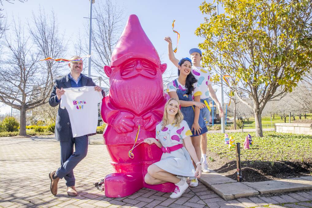 ACT Chief Minister Andrew Barr with Floyd the giant pink gnome and children's entertainers, The Beanies, at the announcement of the Floriade: Reimagined festival in Woden. Picture: Sitthixay Ditthavong