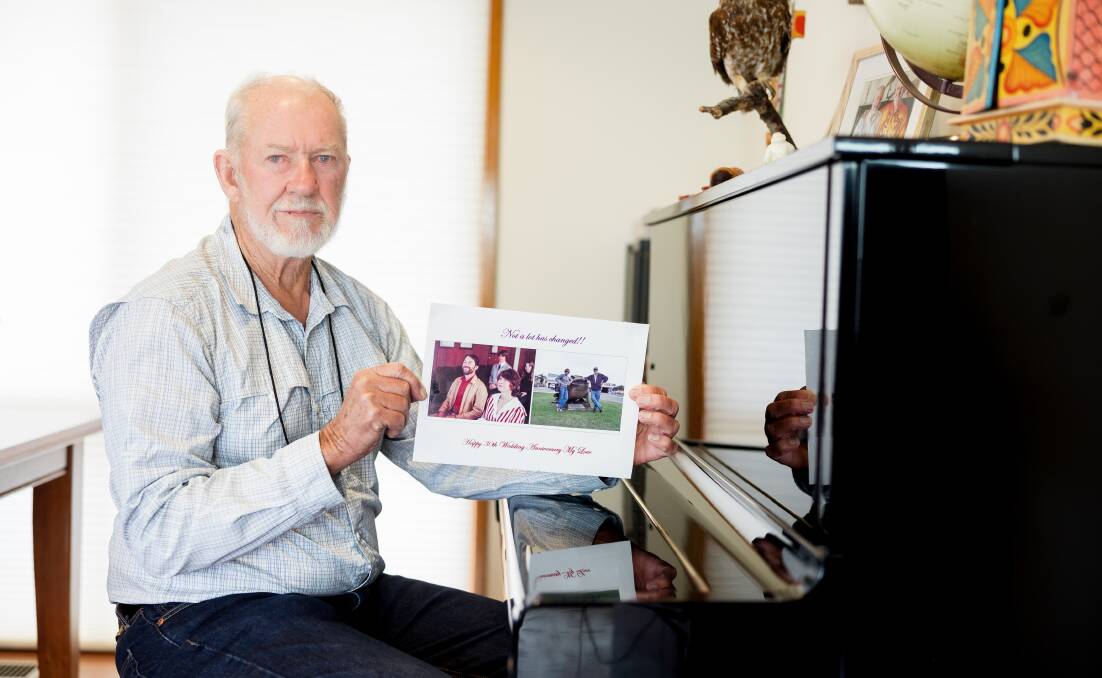 Roy Harvey with a picture of his late wife Anne. Picture by Sitthixay Ditthavong