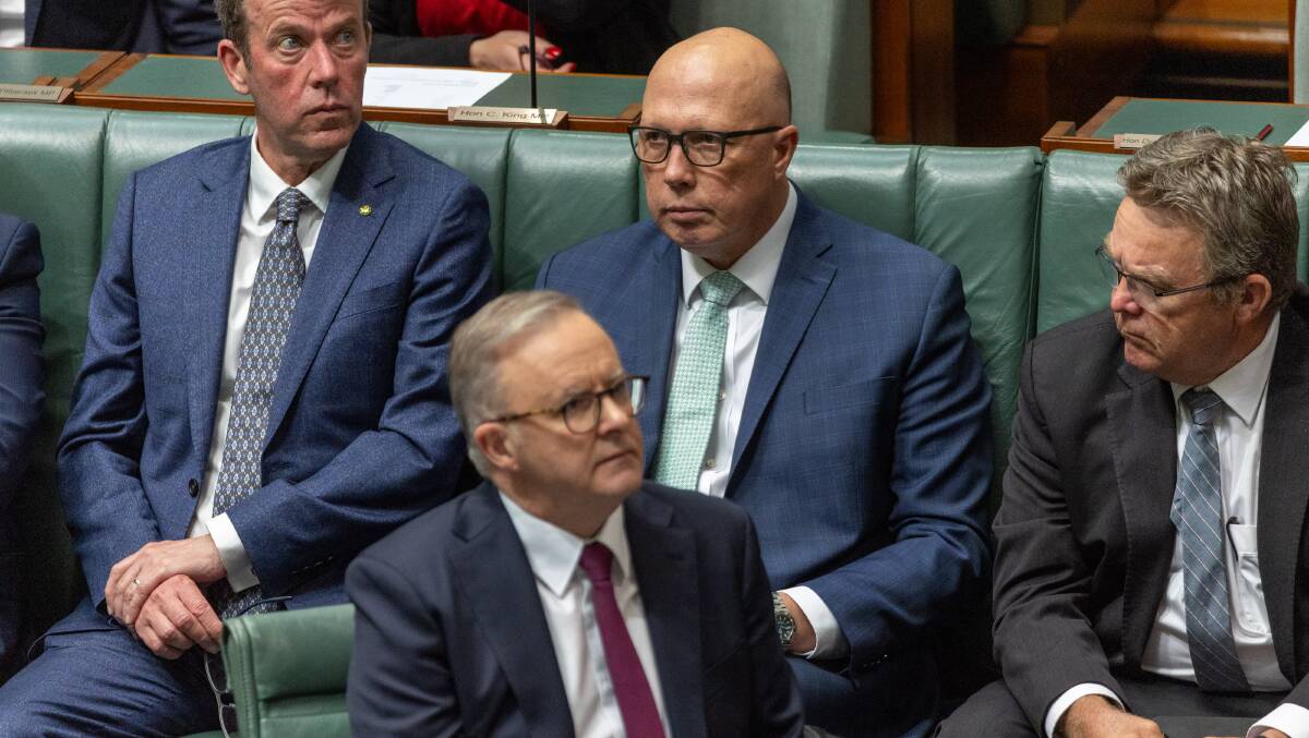 Opposition Leader Peter Dutton, behind, took the wheel from Prime Minister Anthony Albanese, front. Picture by Gary Ramage