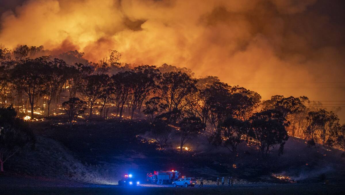 A spot fire from the Clear Ridge bushfire in Michelago. Picture: Sitthixay Ditthavong