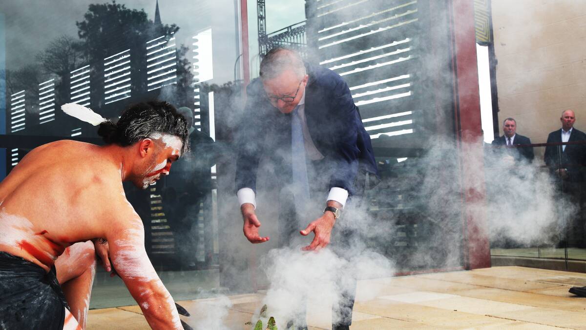 Prime Minister Anthony Albanese attend a smoking ceremony in Wonnarua country, Muswellbrook. Picture by Peter Lorimer