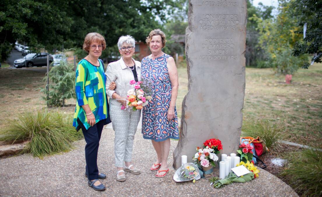 Marianne Bateup, Anne Walls, and Jeanette Regan were school friends with Carmel Anne Smith, who along with six others, perished in the Woden flood on Australia Day fifty years ago. Picture: Sitthixay Ditthavong