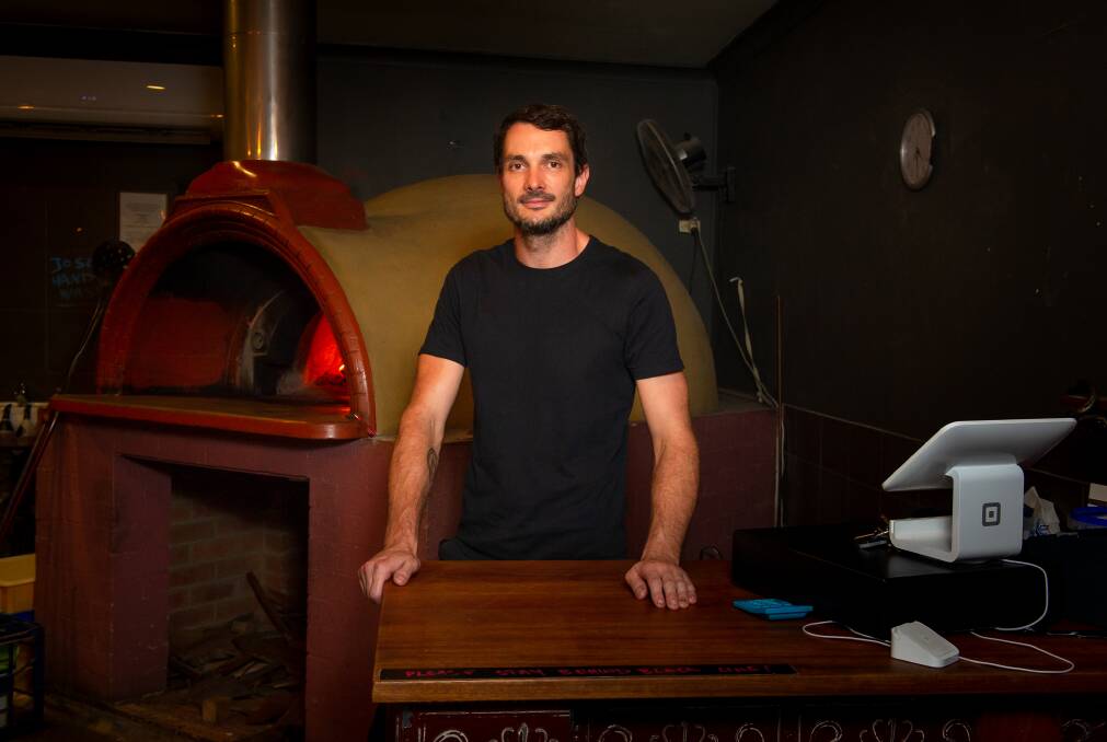 Pizza Gusto owner Elliott Franklin-Browne is grateful for the ACT government's rental support. Picture: Elesa Kurtz