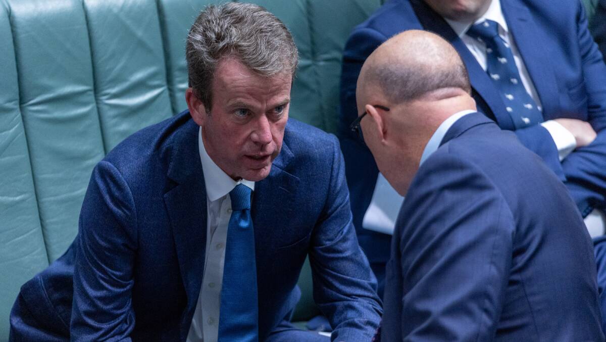 Dan Tehan speaks with Peter Dutton in Parliament. Picture by Gary Ramage