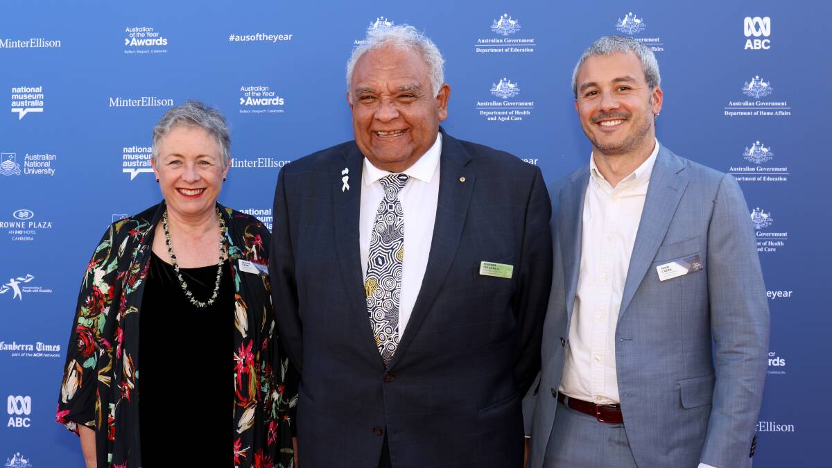 Professor Tom Calma, middle, with his wife Heather and son Thom. Picture by James Croucher