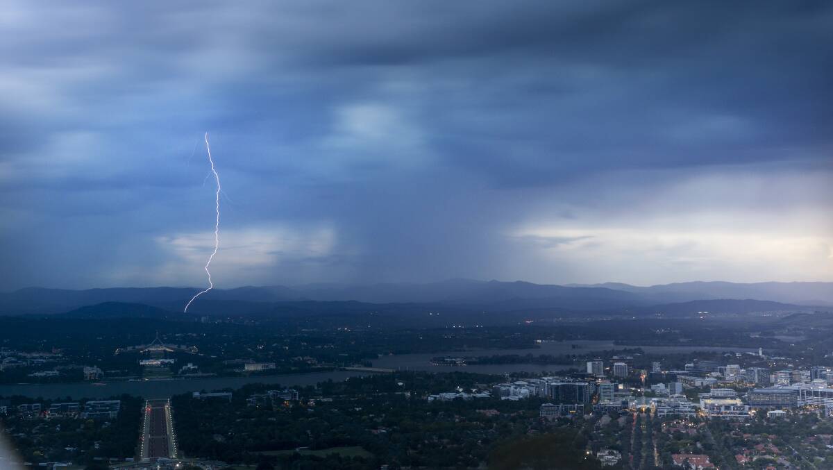 Lighting strikes over Canberra. Pictures by Gary Ramage