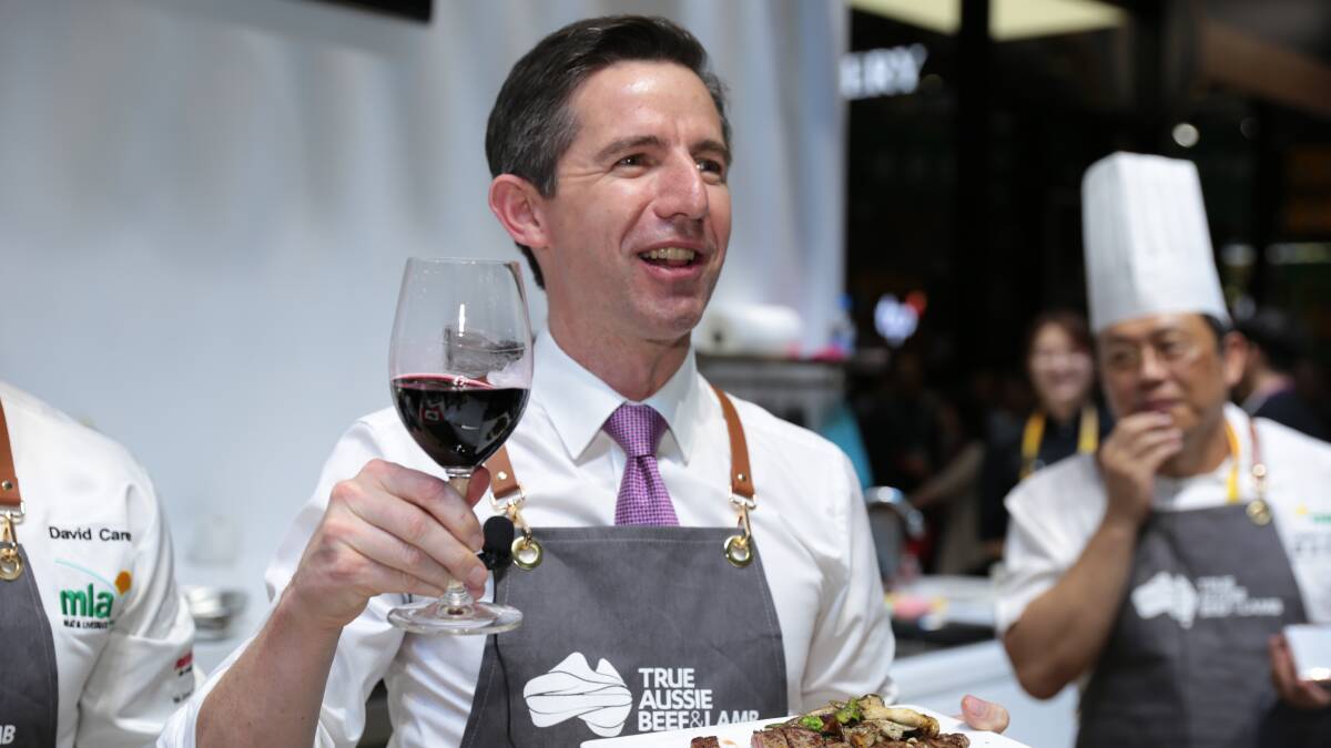 Former trade minister Simon Birmingham participates in a cooking demonstration in Shanghai. Picture DFAT
