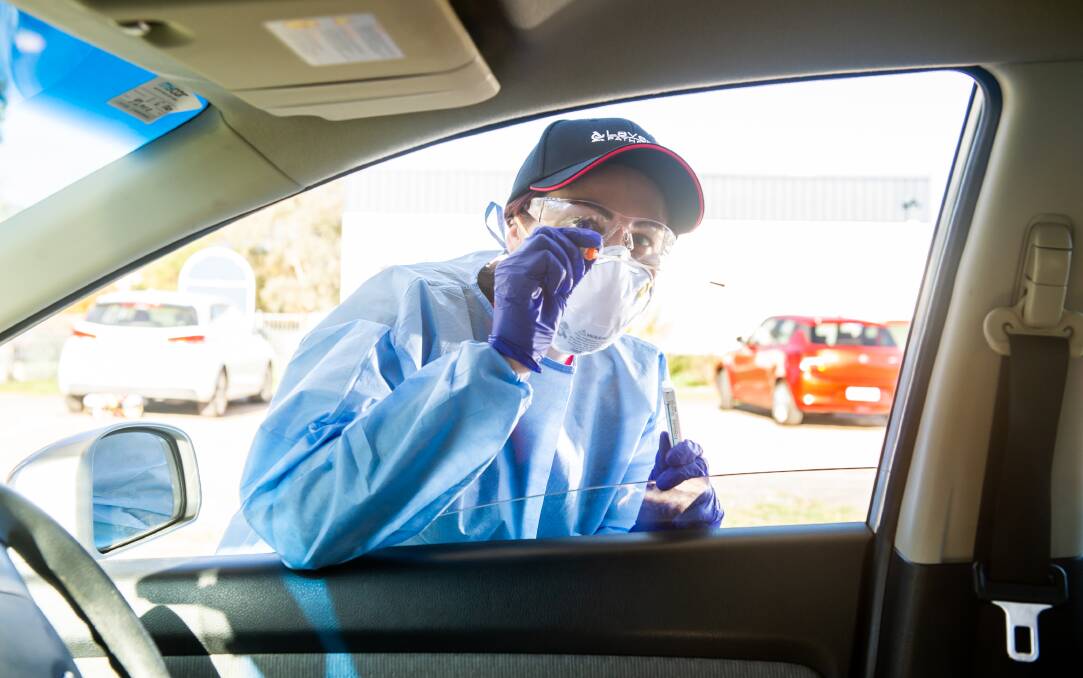 Laverty pathology area coordinator Ann Deniz testing for coronavirus in Canberra. Picture: Karleen Minney