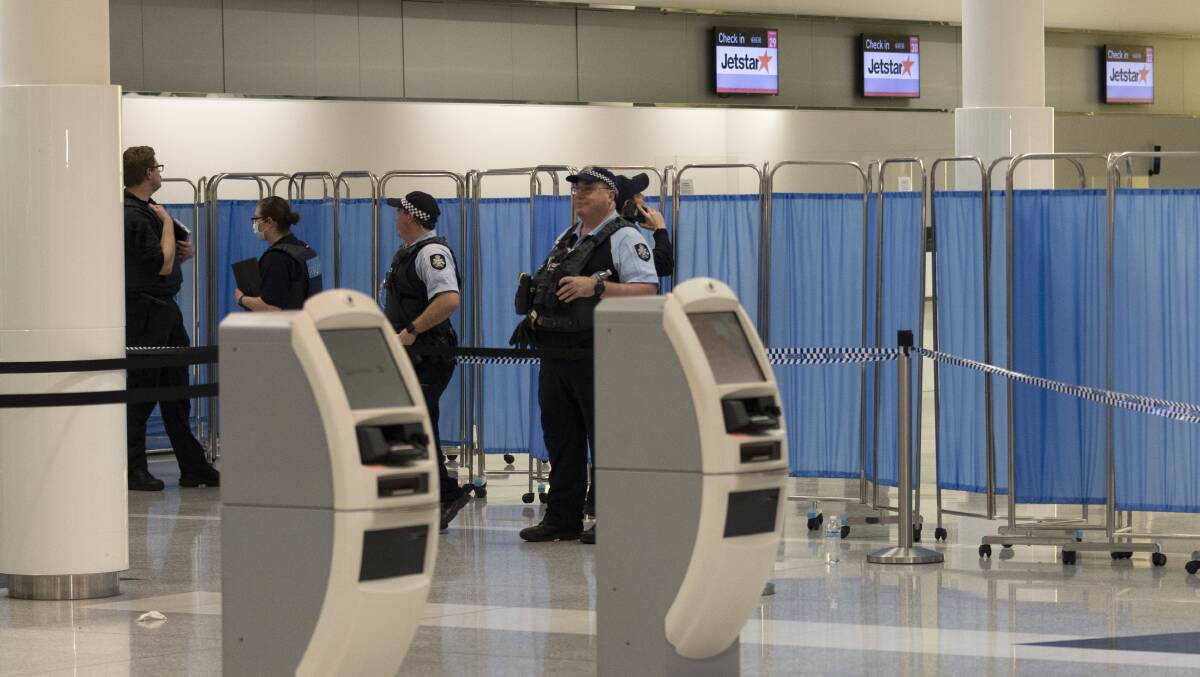 Police stationed at a quarantined area at the airport after the shooting incident. Picture: Keegan Carroll