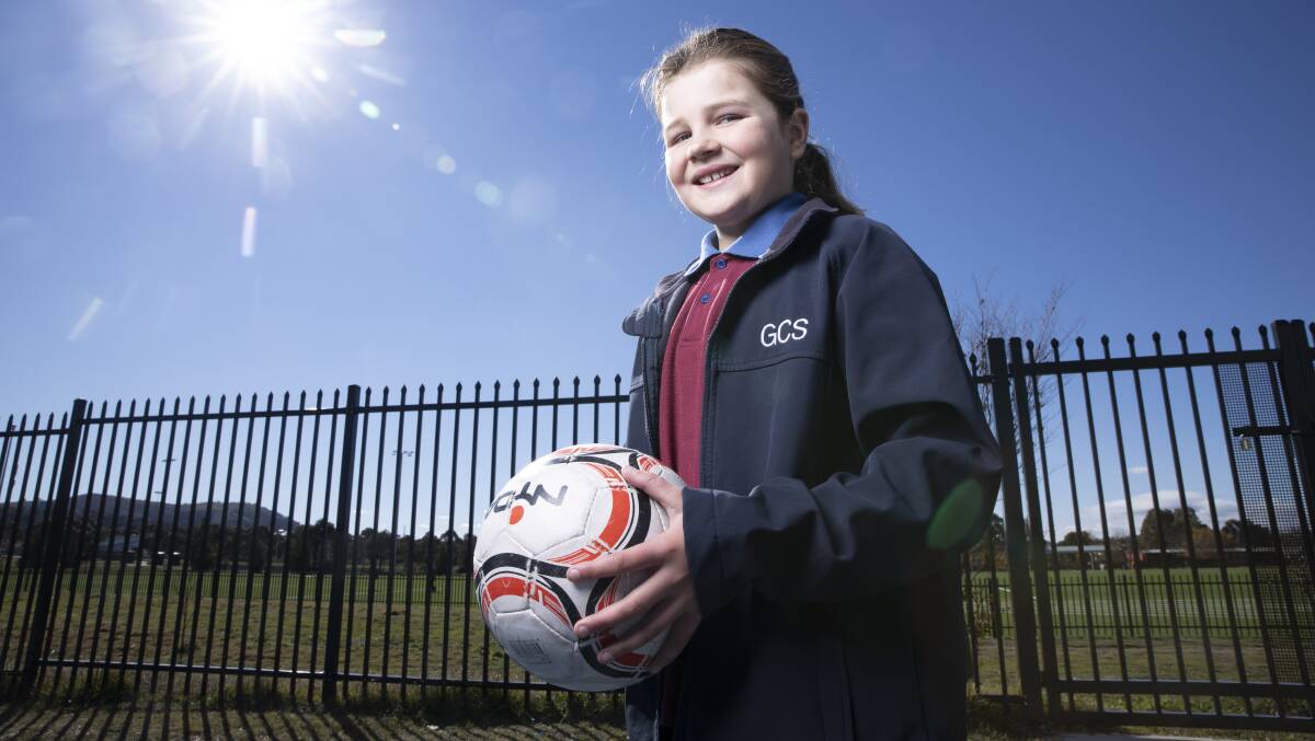 Ten-year-old Jessica Pearson went to the 2019 Womens World Cup having won the right to carry the ball on to the pitch for the Matildas v Brazil match in Montpellier. Picture: Sitthixay Ditthavong