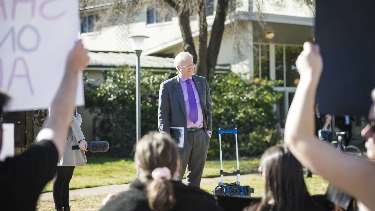 ANU vice-chancellor Brian Schmidt visits students holding a sexual violence reforms vigil outside University House. Picture: Sitthixay Ditthavong