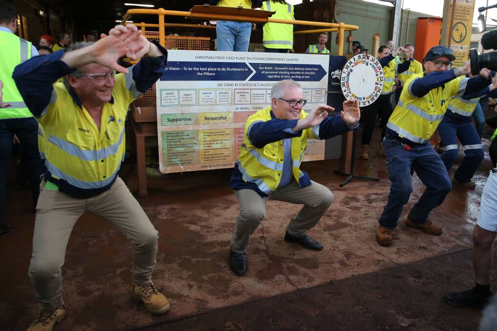 Andrew 'Twiggy' Forrest and Scott Morrison limber at a recent mine visit. Picture: Getty Images