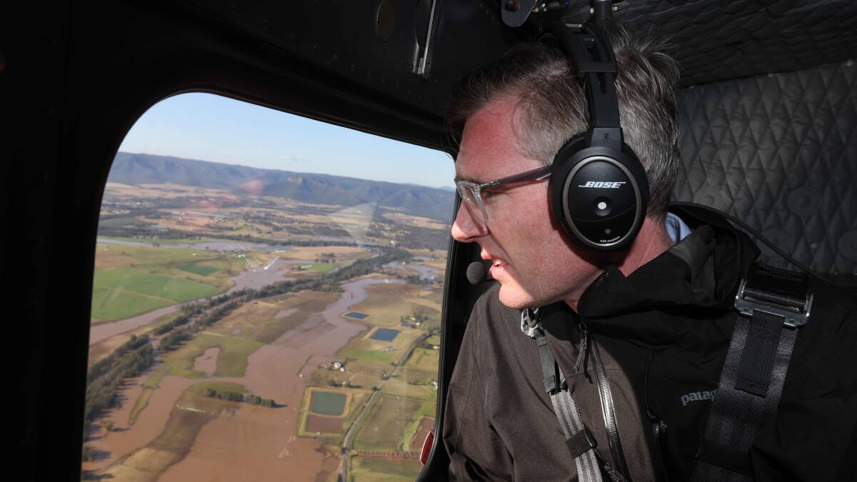 NSW Premier Dominic Perrottet inspects flooding damage from a helicopter. Picture Getty Images