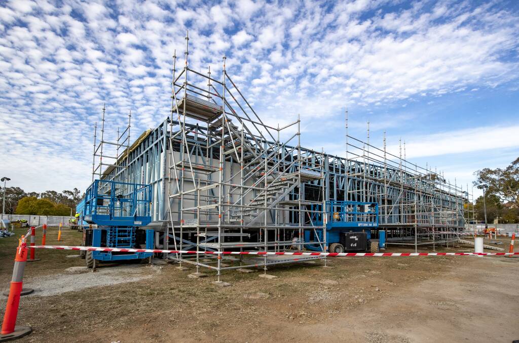 Temporary COVID-19 emergency department under construction at Garran Oval. Picture: Sitthixay Ditthavong