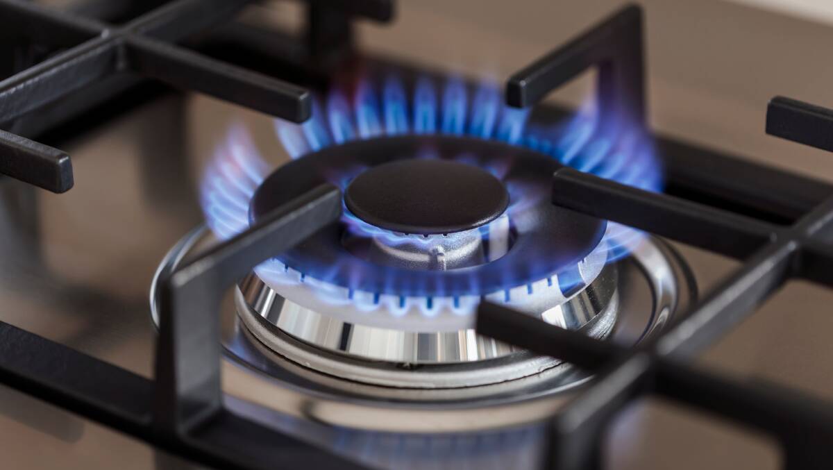 It's only a matter of time before gas-fired woks are a thing of the past. Picture by Shutterstock