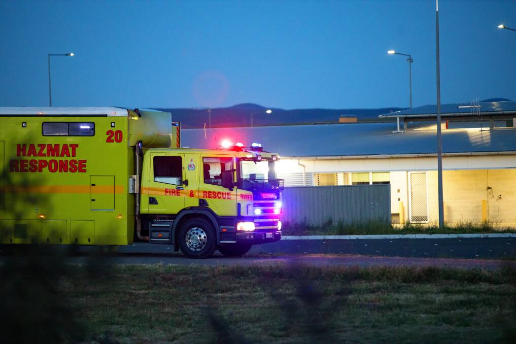 Emergency services arrive at the prison on Tuesday night. Picture: Sitthixay Ditthavong