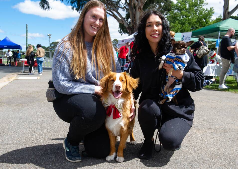Dayna Brown of Calwell with dog Kyro and Jessica Finnigan of Nichols with Jinx.