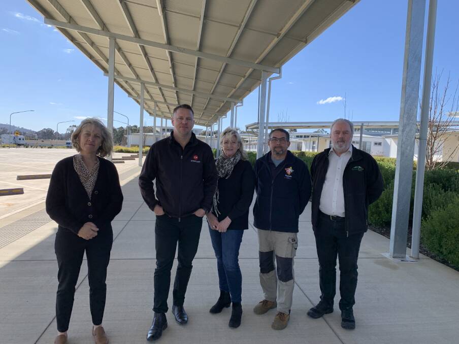 Canberra Park's empty bus carpark behind them, Frances Egan-Richards, David Grigg, Sue Anderson, Dallas Shang and John Bell are among the business representatives from the accommodation houses affected as students are locked out of visiting the ACT. Picture: Peter Brewer