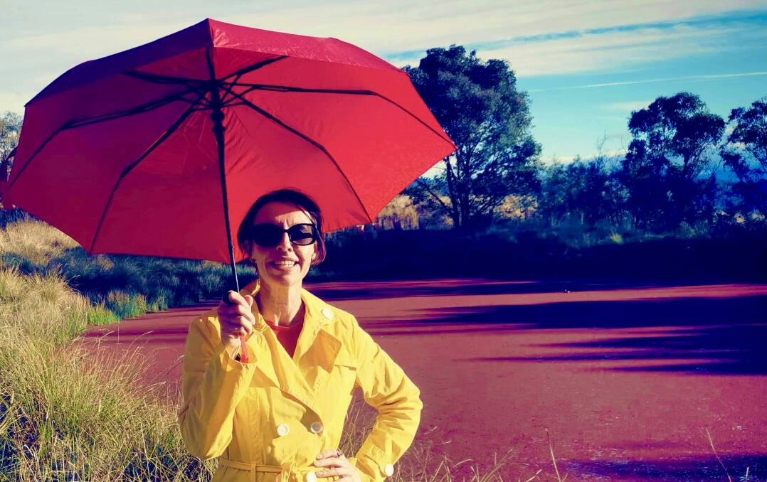 Rose Higgins strikes a pose at Canberra's red dam. Picture by Tim the Yowie Man